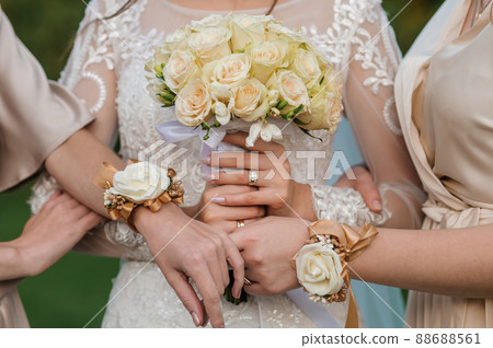 Bouquet of flowers in the hand of the bride Bouquet of flowers in the hand of the bride 88688561
