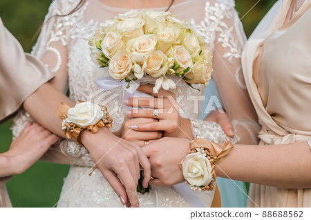 Bouquet of flowers in the hand of the bride Bouquet of flowers in the hand of the bride 88688562
