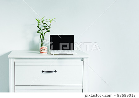 Dentist table with laptop and teeth model. Computer on dentist table, template for design. 88689012