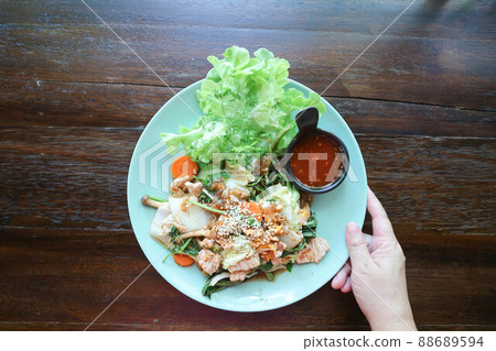 stir fried vegetable with pork and dip or sukiyaki 88689594