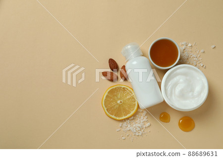 Natural spa cosmetics on beige background, top view 88689631