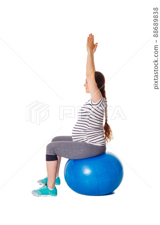 Pregnant woman doing exercises with exercise ball Pregnant woman doing exercises with exercise ball 88689838