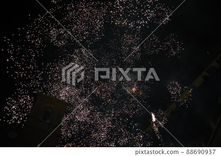 Colorful fireworks on a hot summer night 88690937