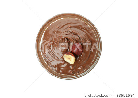 Bowl with chocolate paste and nuts isolated on white background Bowl with chocolate paste and nuts isolated on white background 88691684