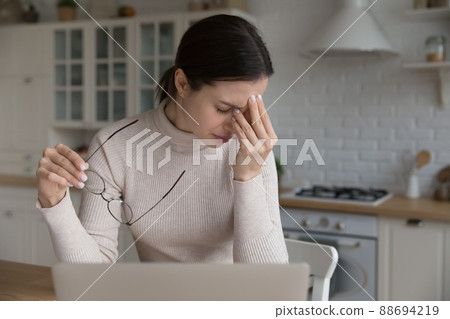 Frustrated depressed freelance worker getting bad news at home workplace 88694219