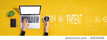 Patent concept with person using laptop computer Patent concept with person using laptop computer 88694866