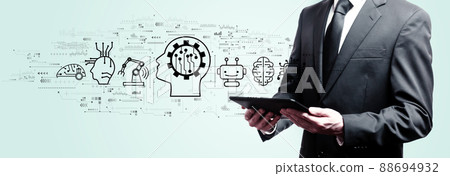 Future technology concept with businessman holding a tablet Future technology concept with businessman holding a tablet 88694932