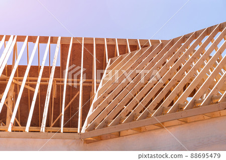 Framed residential home with construction of a timber frame house 88695479