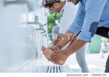 Man muslim perform ablution or wudu at the mosque Man muslim perform ablution or wudu at the mosque 88696716