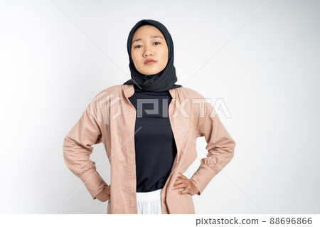 serious young brave muslim woman with hand on her hip 88696866