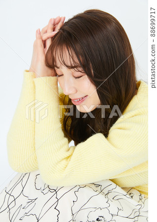 Young woman in knit girly fashion bangs bangs 88699717