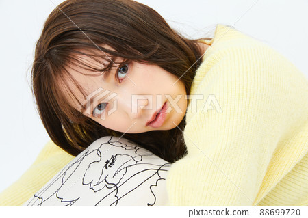 Young woman in knit girly fashion bangs bangs 88699720