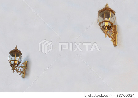 Classic wall light on the interior wall of the building 88700024