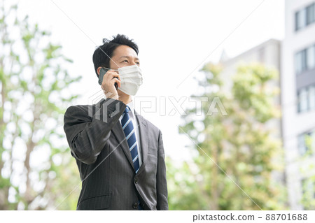 Businessman phone mask smartphone Businessman phone mask smartphone 88701688