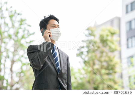 Businessman phone mask smartphone Businessman phone mask smartphone 88701689