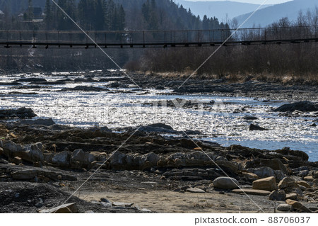 Mountain river in the mountains of Ukraine. Peremiyskaya river, Ivano-Frankivsk region. Spring 2022. 88706037