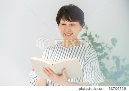 Senior woman reading portrait 88706516