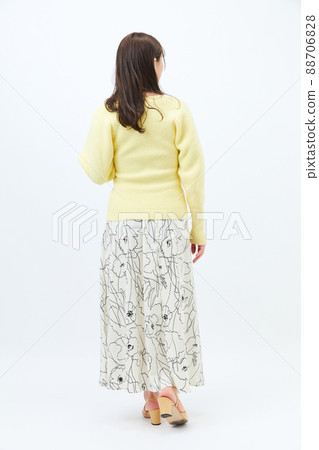 Young woman in knit girly fashion bangs bangs Young woman in knit girly fashion bangs bangs 88706828