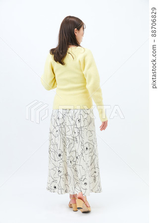 Young woman in knit girly fashion bangs bangs Young woman in knit girly fashion bangs bangs 88706829
