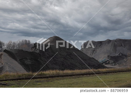 Mountain of black stone, basalt mine. Black stones. 88706959