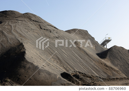 Accumulated basalt stones, mountain of black stone. Mining industry 88706960