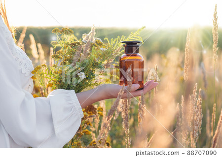 Drug bottle in hand, Concept image. 88707090