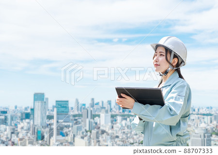 Construction workers against the backdrop of the city Construction workers against the backdrop of the city 88707333