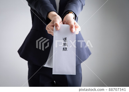 Women submitting a letter of resignation Retirement 88707341