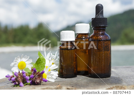 Set amber bottles with medicines on natural background. Natural daylight. Set amber bottles with medicines on natural background. Natural daylight. 88707443