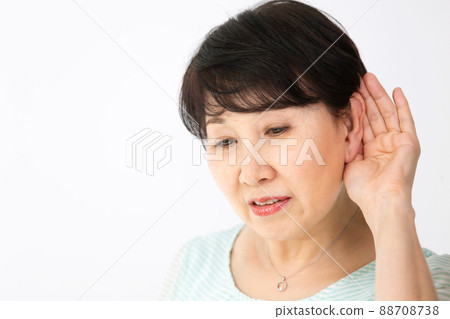 Senior woman deafness hearing 88708738