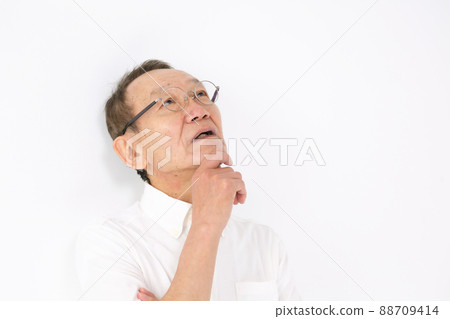 Senior man worries and thinks Senior man worries and thinks 88709414