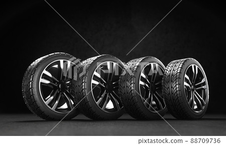 Four car wheels on the asphalt on a black background. 3D rendering illustration. 88709736