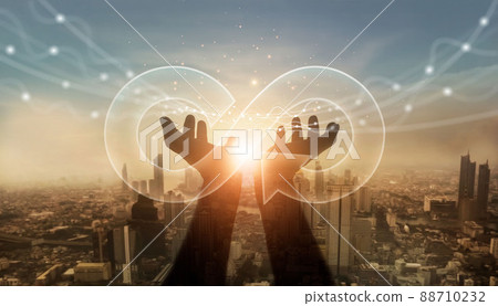 Businessman hold circular economy icon. Sustainable strategy approach to eliminate waste and pollution for future growth of business and environment, design to reuse and renewable material resources. 88710232