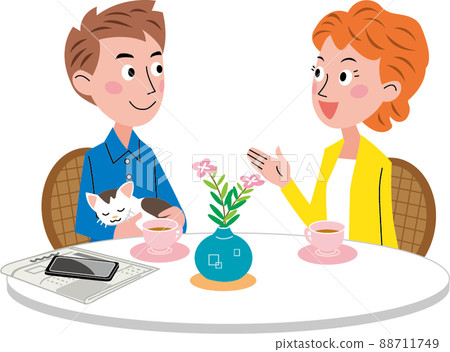 A young husband and wife holding a cat are talking at the table. There are coffee flowers and newspaper smartphones on the table. 88711749