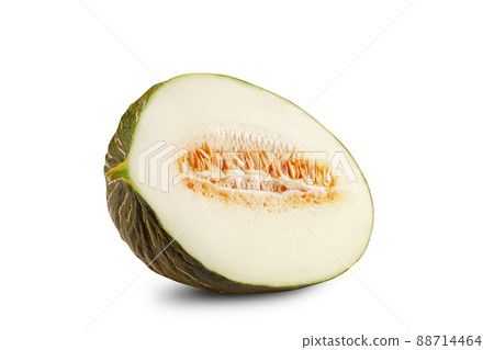 Half of delicious green tendral melon in cross-section, isolated on white background with copy space for text or images. Side view. Close-up shot. Half of delicious green tendral melon in cross-section, isolated on white background with copy space for text or images. Side view. Close-up shot. 88714464