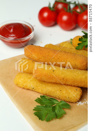 Concept of tasty food with cheese sticks on white background 88715470