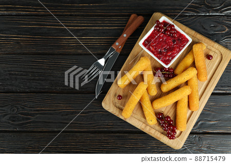 Concept of tasty food with cheese sticks on rustic wooden table 88715479