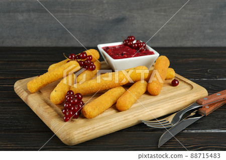 Concept of tasty food with cheese sticks on rustic wooden table 88715483