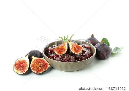 Bowl with fig jam and ingredients isolated on white background 88715912