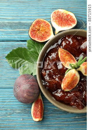 Bowl with fig jam and ingredients on wooden background Bowl with fig jam and ingredients on wooden background 88715915