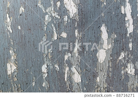 Texture of old dark grey wooden wall with cracking white paint Texture of old dark grey wooden wall with cracking white paint 88716271