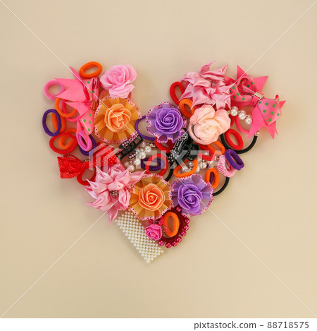 Different hair clips on beige background. Flat lay. Top view. 88718575