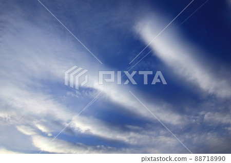 Airplane over the wavy clouds Airplane over the wavy clouds 88718990