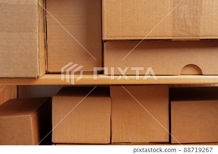 Cardboard boxes stacked in a pile for background 88719267