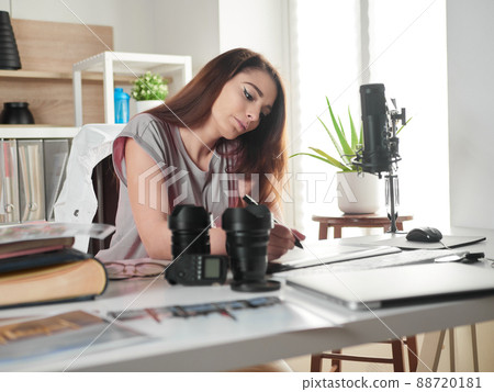 Graphic designer photographer working in home office Graphic designer photographer working in home office 88720181
