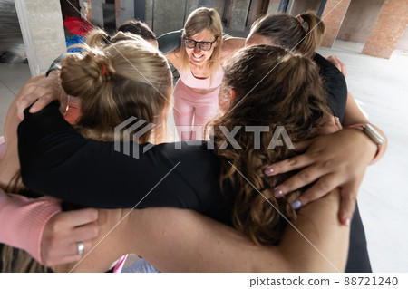 Group of young and attractive sporty caucasian women wearing sports attire and of different body 88721240