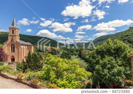 Full of green trees and plants in bloom Tarn valley, Church of St. Christopher 88723880