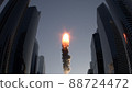 Fire ball flies between skyscrapers 88724472