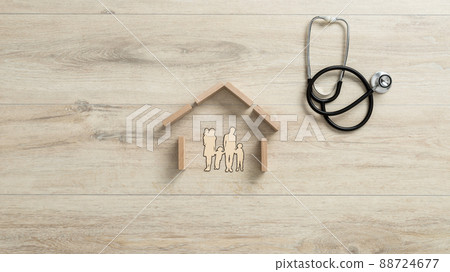 Cut outs of a family with children in a house, conceptual of home insurance 88724677