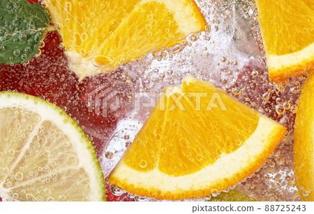 Fresh Fruit Lemonade with Sparkling Water and Ice Cubes Fresh Fruit Lemonade with Sparkling Water and Ice Cubes 88725243
